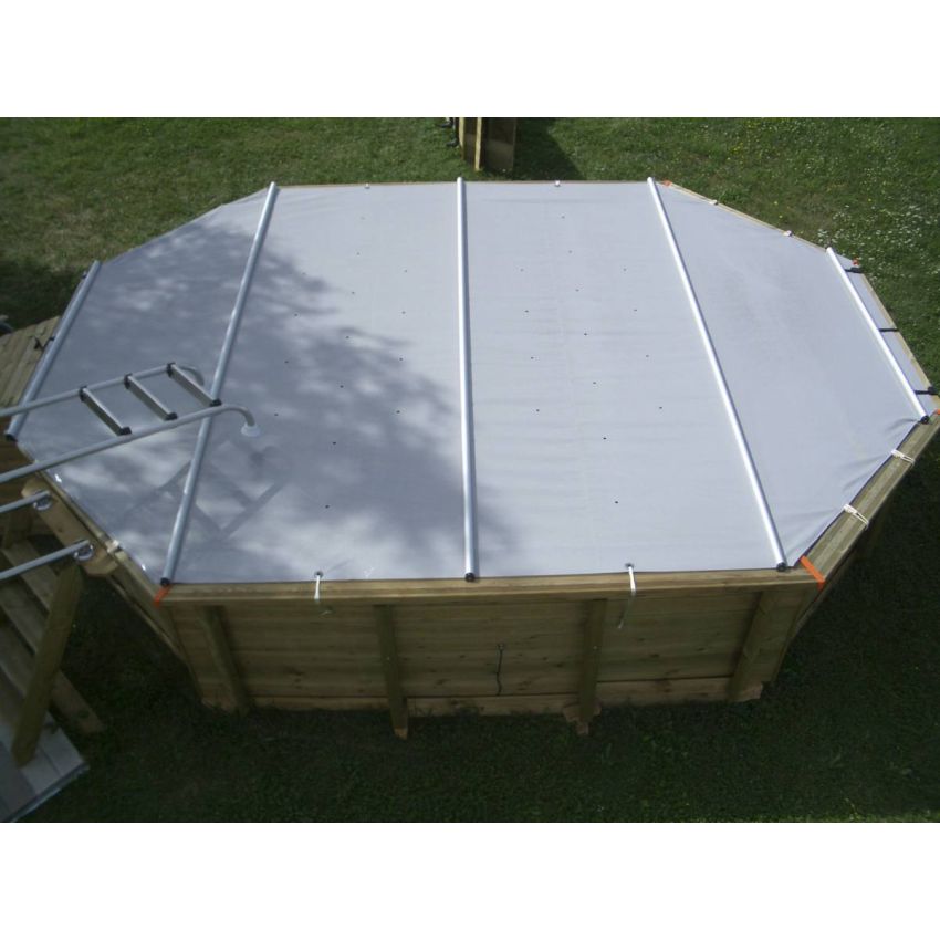 Bâche à barres pour piscine octogonale allongée 650x470cm